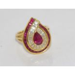 18ct yellow gold, red stone and diamond ring red stones test as garnet or spinel, diamonds are