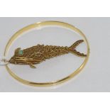 Silver gilt articulated fish pendant together with a gold plated bangle