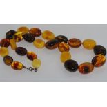 Mixed amber necklace with silver clasp, size: approx 65cm length
