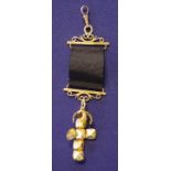 Gold mounted Masonic ball cross with a 9ct gold clasp and ball and a ribbon suspended by 14ct gold