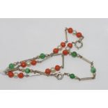 Two 9ct white gold gemset bracelets one coral, one jade, total weight: approx 7.9 grams