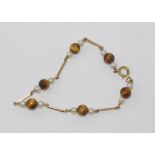 Vintage 9ct gold and tiger's eye bracelet weight approx 4.5 grams