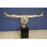 Art deco style sculpture silver on black base, 76 cm wide, 53 cm high approx.