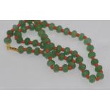 Green stone and coral necklace with gold filled clasp, green stone testing suggests jade