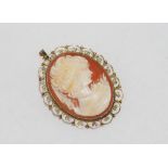 Cameo brooch / pendant with gold filigree surround marked K14, weight: approx 7 grams,size: approx