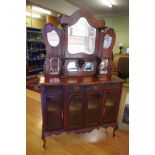 Edwardian art nouveau etagere with mirrored open shelf back above a drawer and glazed doors, 124cm