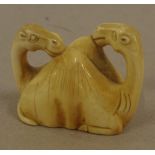 Antique carved ivory camel netsuke circa 1920s, H3cm approx