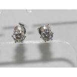 18ct white gold and diamond studs 6 claw set TDW=0.85cts H/Si1, weight: approx 1.33 grams