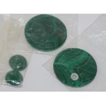 Two good malachite discs with two smaller discs suitable for earrings