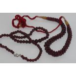 Two garnet bead necklaces