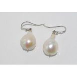 Baroque pearl earrings on silver hooks