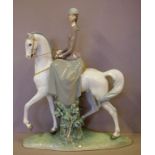 Large Lladro lady on horse figure 44cm high approx., horse missing one ear