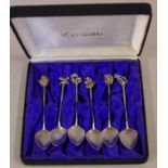 Cased Australian sterling silver figural spoons depicting various Australian flora