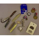 Collection of vintage pocket knives including sterling & advertising & various badges & medallions
