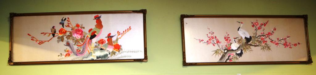 Pair of oriental needlework panels in gilt frames, 95cm wide, 36cm high