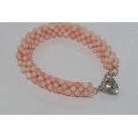 Pink angelskin coral bracelet with silver heart clasp