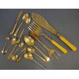 Quantity of sterling silver flatware to include silver rimmed fish servers, spoons, and butter