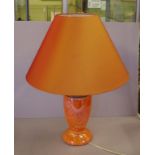 Aladdin Crown Devon lamp in orange lustre glaze, converted to electricity, 65cm high
