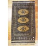 Vintage middle eastern woolen rug in grey and cream tones, 118cm X 66cm approx