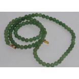 Jade necklace with a silver gilt clasp size: approx 70cm length