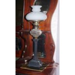 Antique oil lamp with milk glass shade, 53cm high approx.