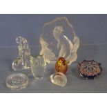 Seven assorted glass paperweights to include Mats Jonasson, Strathearn and Isle of Wright