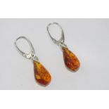 Sterling silver and honey amber earrings with hinge and clip fittings