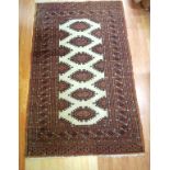 Vintage middle eastern woolen rug in brown and cream tones, 158cm X 97cm approx