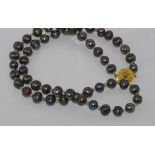 Black pearl and peridot bead necklace