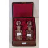 Two antique crystal perfume bottles in original leather case box (lid as inspected)