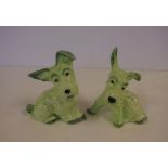 Pair of Wain Melba Ware dog figurines in green hues, 13.5 cm high