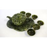 Carved green stone teaset consist of teapot, stand and 6 cups