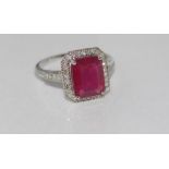 18ct white gold, ruby (3.66ct) and diamond ring includes treated ruby and diamond (19pts), weight: