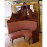 Grand Edwardian mirror backed corner lounge with carved panels, open shelves and front cabriole