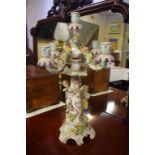 Dresden style five branch candelabrum with cherub and floral decoration, H55cm approx (as