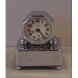 Chrome Swiss desk clock with musical movement, 9cm high approx.