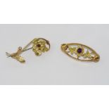 Two vintage gold flower brooches one marked 9ct and tested as 9ct (weight: approx 1.8 grams) the