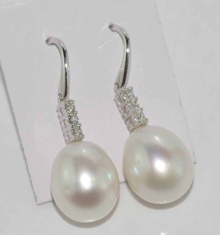 18ct white gold, pearl and diamond drop earrings each set with South Sea pearl 11.5mm and three