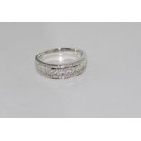 18ct white gold and multi-diamond band TDW=77pts, weight: approx 4.1 grams, size: N-O/7