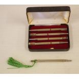 Five sterling silver bridge pens comprising of a cased set of 4 and a single (with tassle), each