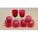Eight early ruby glass items to include wine and cups