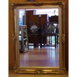 Large decorative gilt framed mirror 117cm x 87cm frame approx.