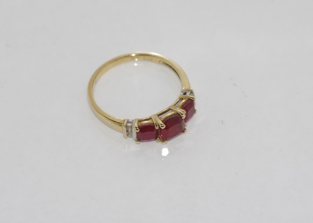 9ct yellow gold and ruby ring (synthetic rubies) with 2 diamonds at each shoulder, weight: approx - Image 2 of 2