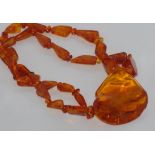 Honey amber necklace with large pendant