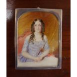 Antique English handpainted miniature circa 1840, depicting a seated lady, silver framed, 9cm x 7cm,