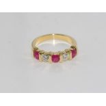 18ct yellow gold, Burmese ruby & diamond ring set with 3 Burmese rubies total 0.88cts and 2 diamonds