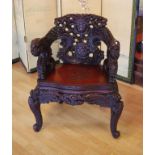 Vintage Chinese armchair ornately carved with turtle arms and back, 72cm wide, 87cm high