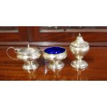 Sterling silver three piece condiment set comprising of a salt cellar (with glass liner), mustard