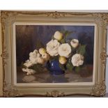 Alan D Baker, (1914 - 1987) Camelias oil on board, signed lower right, 29 by 38cm