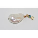 Baroque pearl pendant with 18ct gold bale shaped like a pharaoh head and set with lapis and coral